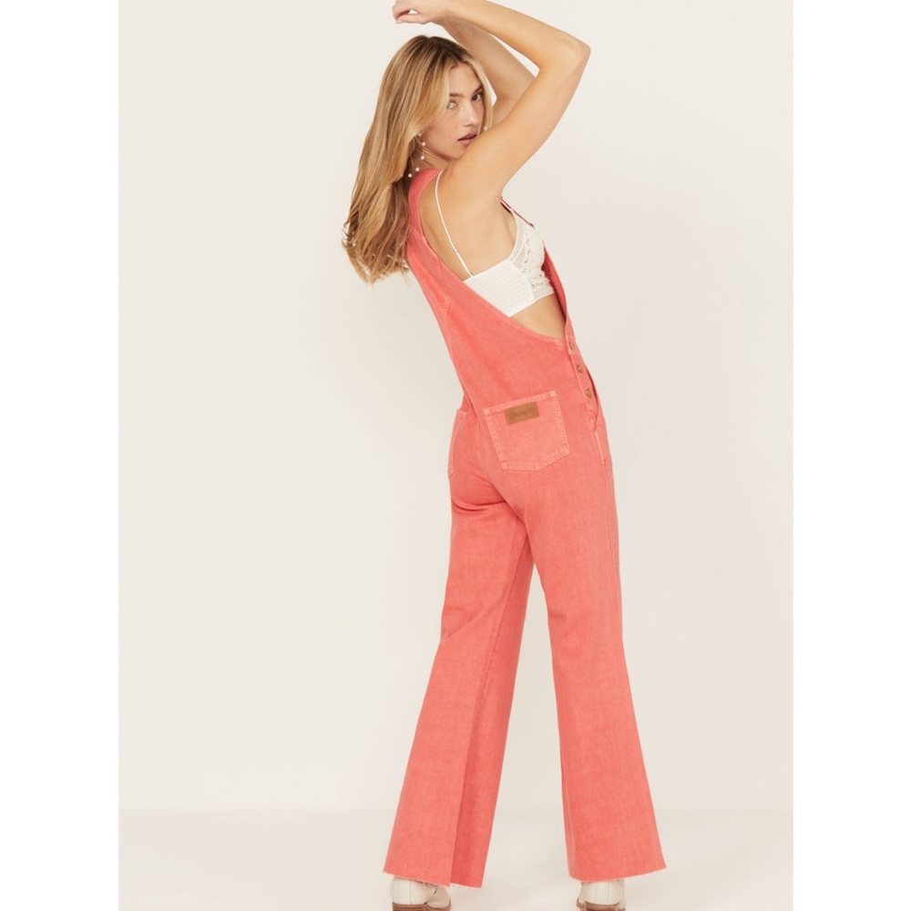 Pink cropped flare wrangler overalls